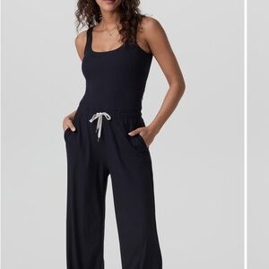 Vuori Women’s size L Pose Scoop Black Jumpsuit with White Drawstring